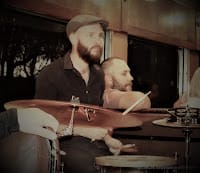 Nathan Power on drum kit on Blues Train
